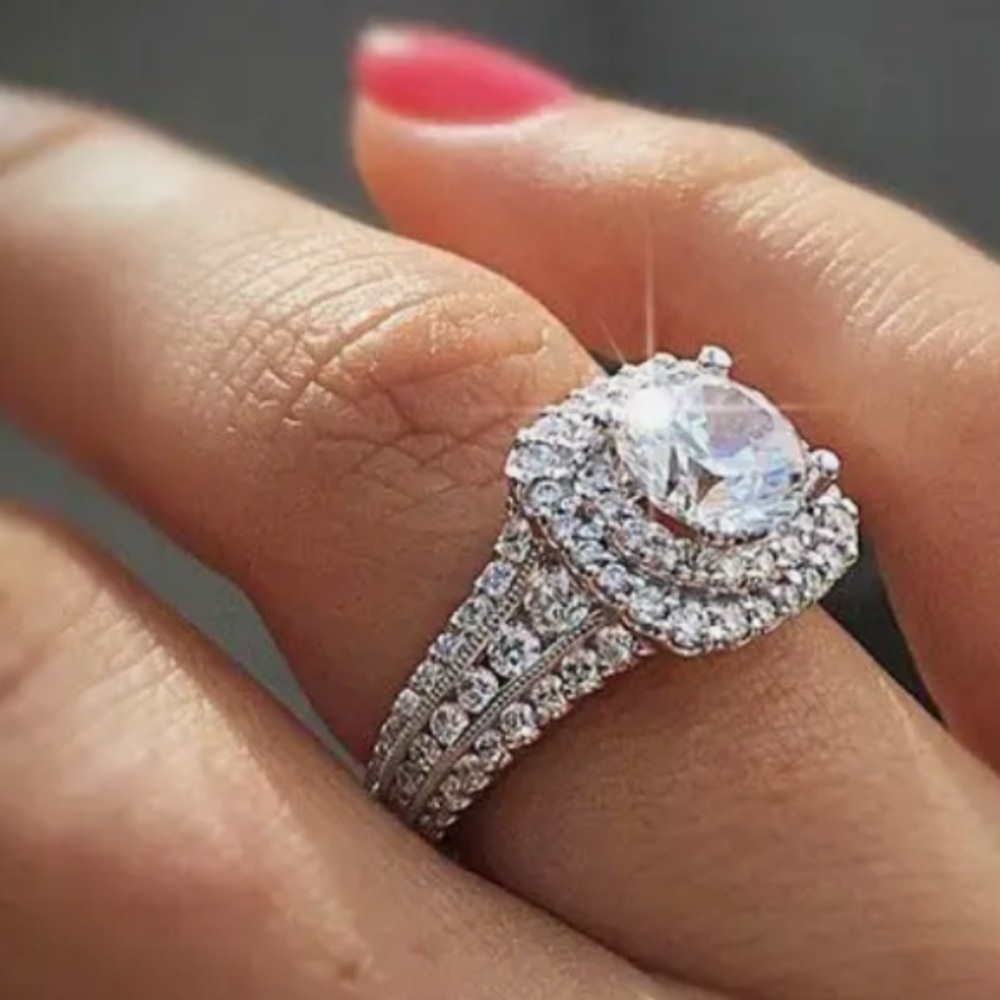 - Platinum Finish Sterling Siver & White Paved Sapphire Ring